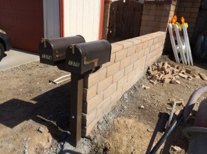 NEW MAILBOXES. This is what I spent a "rainy" Saturday putting together. Gotta wipe off the grinding dust from my brick cutting operation.