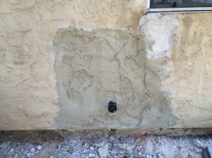 Stucco in place. Looks like crap, but it's functional and it's concave so the pros can cover it up and make it look nice. I'm calling this the "brown" coat for obvious reasons.