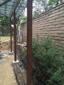 New footings and posts for the trellis.