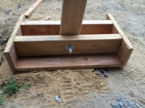 Picture of the shoe of the post jack. The bolt allows the jack to pivot into position, and the shoe provides a stable base.