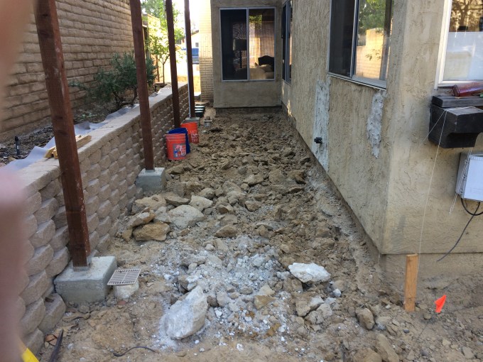 Look at these dirt clods. I needed a pick to break them apart!